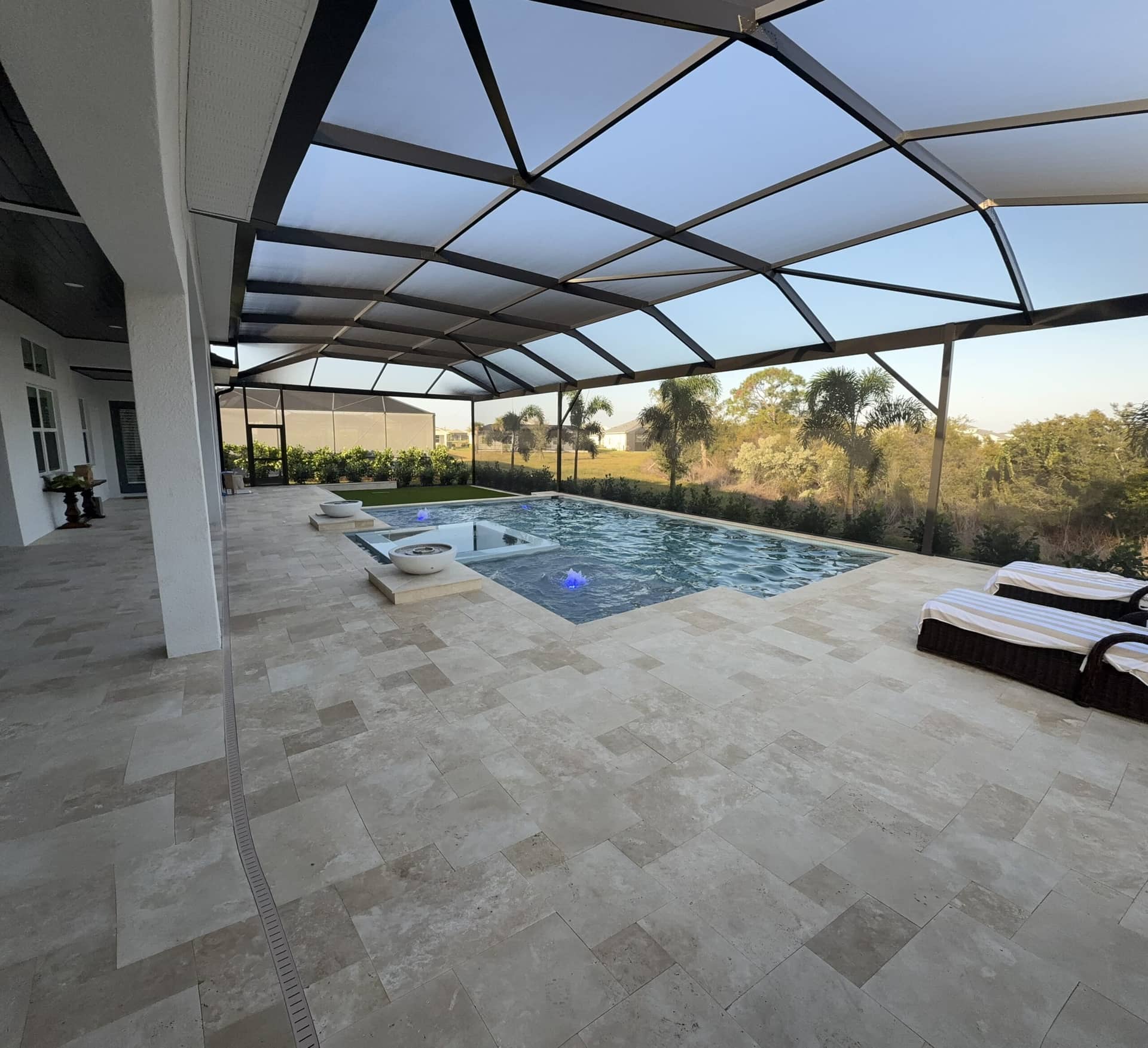 Modern pool equipment pad with variable-speed pump and automation
